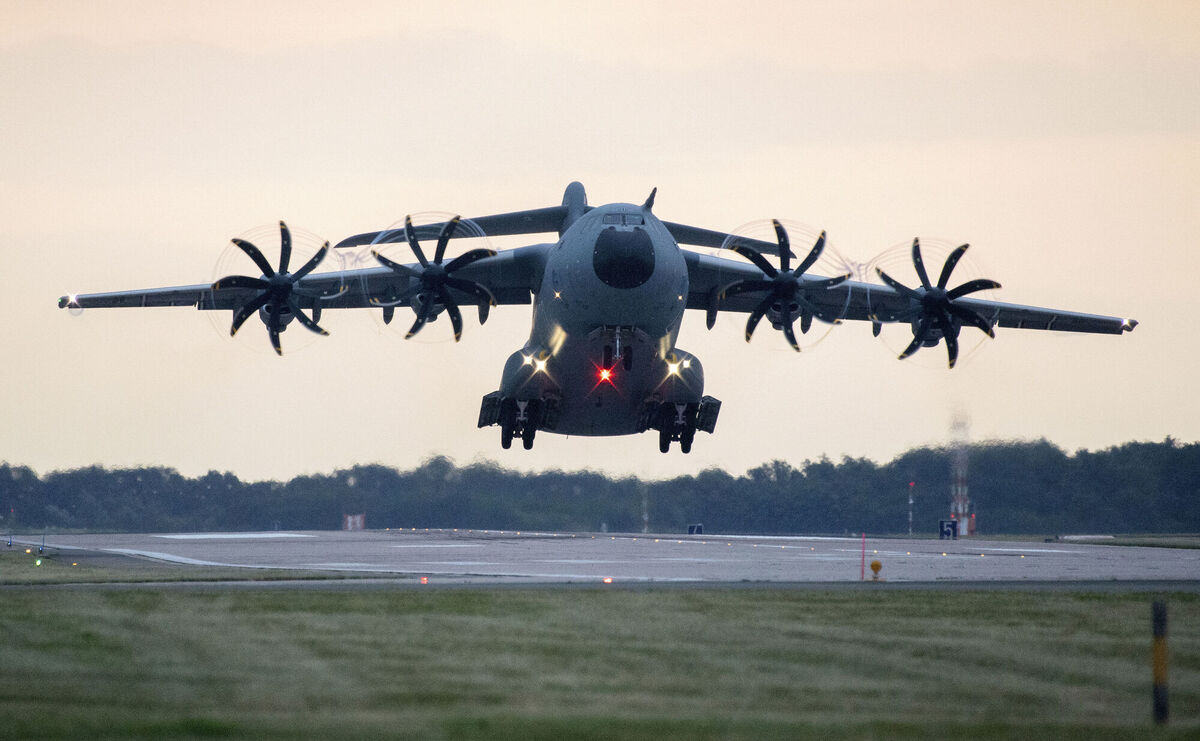 An Airbus A400M transport aircraft of the German Air Force takes off early this morning from the Wunstorf airbase in the Hanover region Monday, Aug. 16, 2021. Mr Coveney said the Department of Foreign Affairs is coordinating with other EU countries in an effort to find alternative routes for Irish citizens.