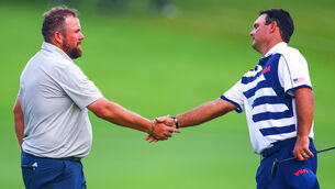 <p>Ireland's Shane Lowry with the USA's Patrick Reed after their opening round at the Tokyo Olympics. Picture: INPHO/James Crombie</p>