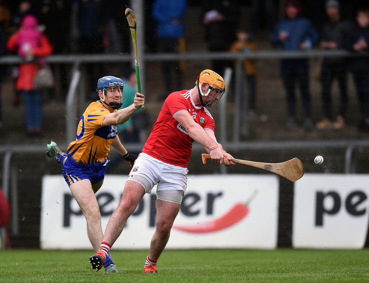 Cork's Declan Dalton with Ian Galvin of Clare. Picture: INPHO/Tommy Grealy