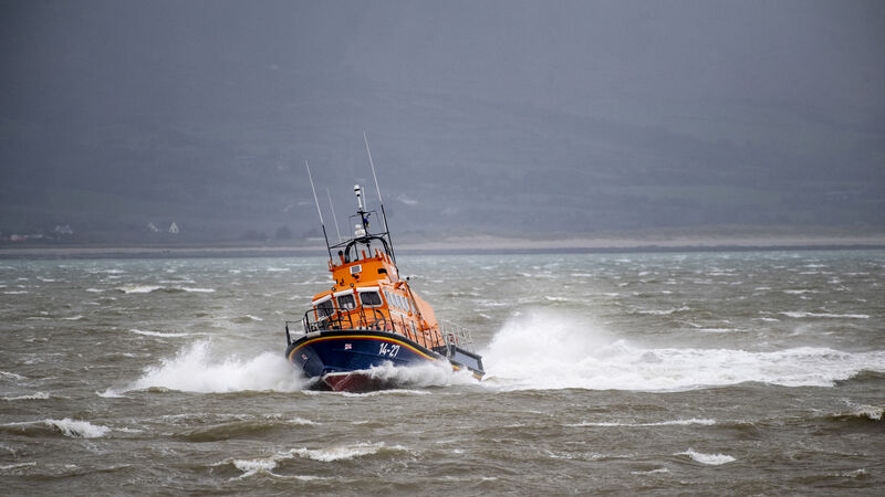 RNLI rescue swimmer off Kerry coast after spotting pod of dolphins RNLI rescue swimmer off Kerry coast after spotting pod of dolphins