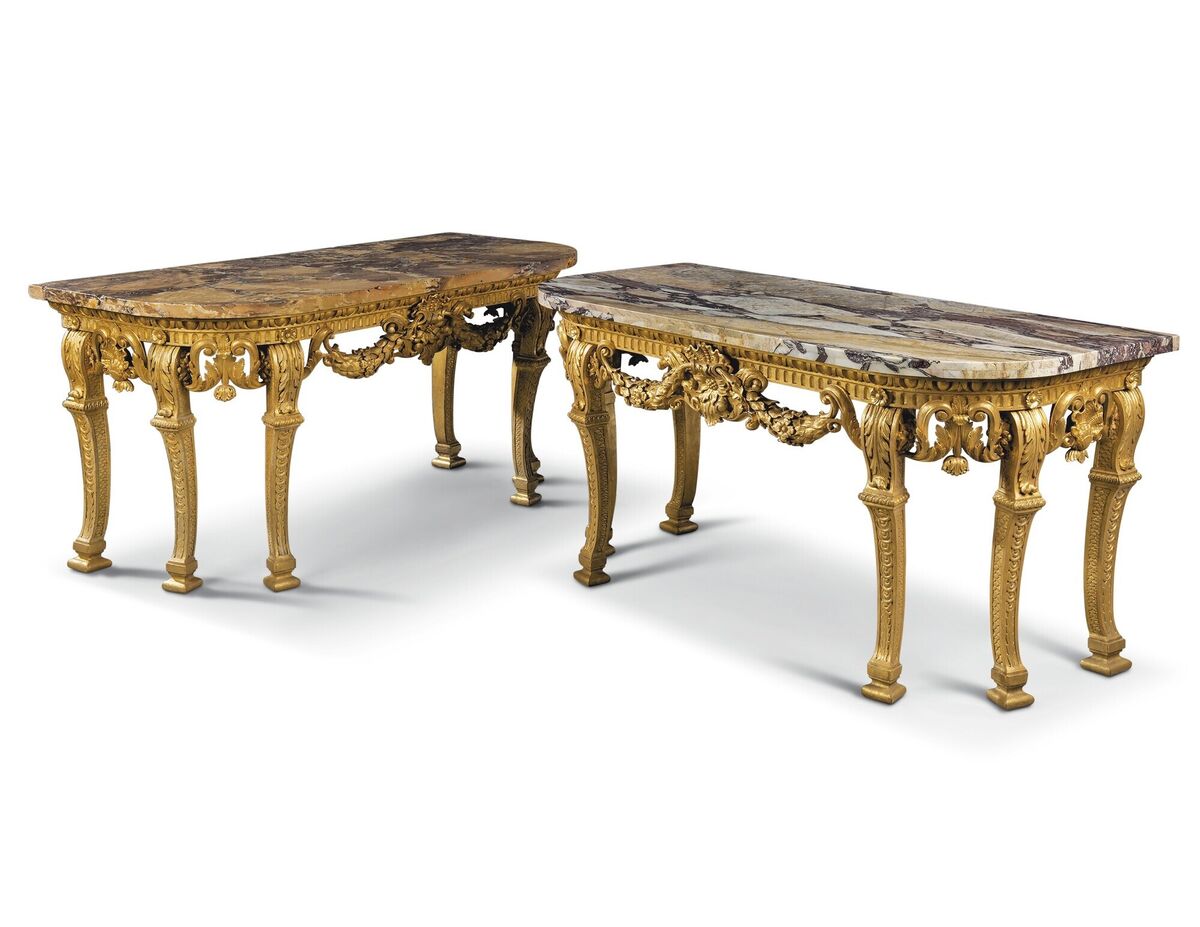 A reunited pair of George III giltwood console tables c1760 after a design attributed to Thomas Chippendale. A reunited pair of George III giltwood console tables c1760 after a design attributed to Thomas Chippendale.