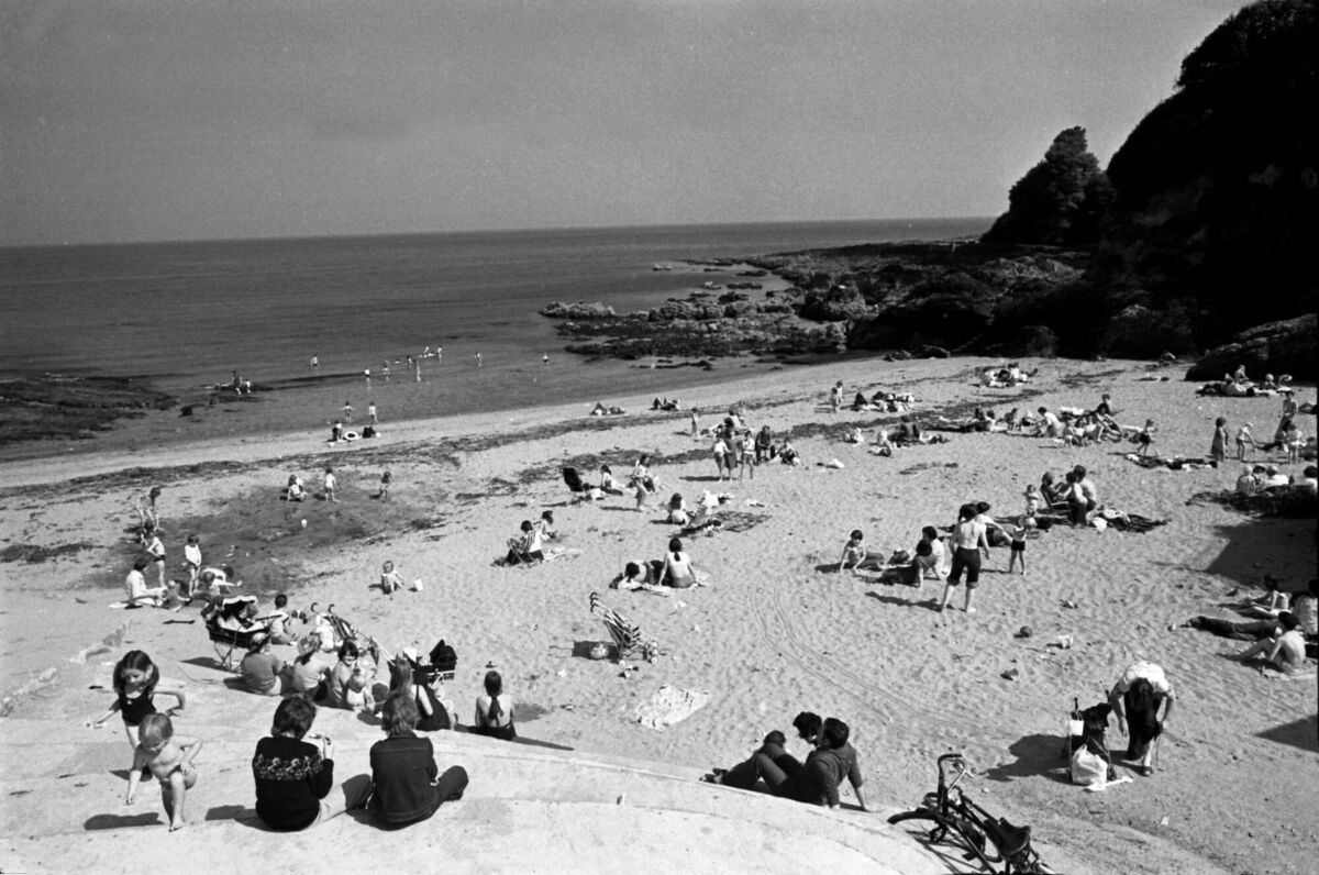 Enjoying a fine summer’s day at Myrtleville beach, Co Cork in June 1977.	Picture: Irish Examiner Archive/Ref 101/199
                    
