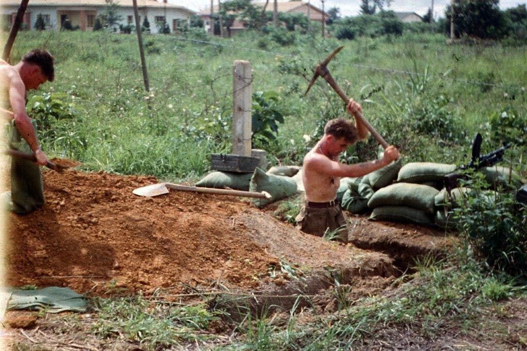 Michael Tighe Digging a trench in Jadotville. “If I could have dug down any further I'd have been in Australia.” Photo: Leo Quinlan Michael Tighe Digging a trench in Jadotville. “If I could have dug down any further I'd have been in Australia.” Photo: Leo Quinlan