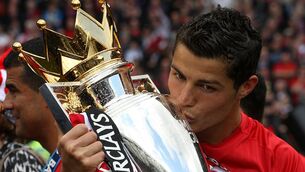 <p>SEALED WITH A KISS: Cristiano Ronaldo gets his hands on the Premier League trophy during his first spell at Old Trafford. Can he and United scale such heights again? 	Picture: PA</p>