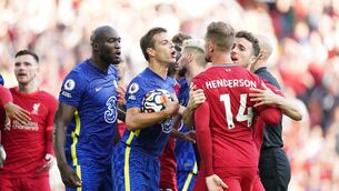 <p>Chelsea's Cesar Azpilicueta (second right) and Liverpool's Jordan Henderson (right) clash following Liverpool's equaliser during the Premier League match at Anfield, Liverpool. Picture: Mike Egerton/PA Wire. </p>