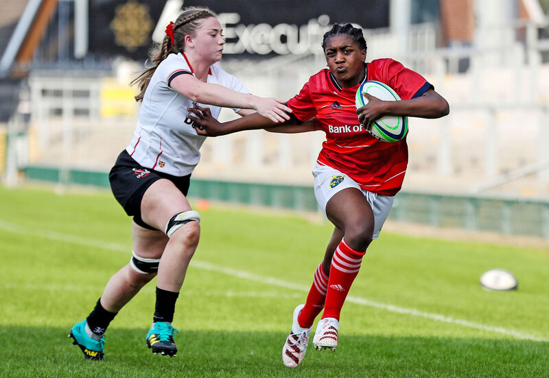 Munster's Chisom Ugwueru and Helen McGhee of Ulster at Kingspan Stadium