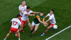 <p>
                <span class="contextmenu emphasis textWhite">NO WAY THROUGH: Kerry’s Diarmuid O’Connor finds his route to goal blocked by Tyrone players, from left, Mark Bradley, Ben McDonnell, Michael McKernan, and Darragh Canavan, during Saturday’s All-Ireland SFC semi-final at Croke Park. </span>	Picture: Daire <span class="contextmenu emphasis textWhite">Brennan/Sportsfile</span>
            </p>