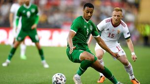 <p> Adam Idah of Republic of Ireland and Laszlo Kleinheisler of Hungary during the international friendly match in Budapest</p>