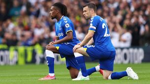 <p>Alex Iwobi (L) and Seamus Coleman of Everton take a knee in support of the Black Lives Matter movement. Coleman played a key role in the deal that made the FAI the latest national soccer association to pay its men’s and women’s senior squads equal match fees. <span class="contextmenu emphasis CaptionCredit">Picture: Marc Atkins/Getty</span>
            </p>