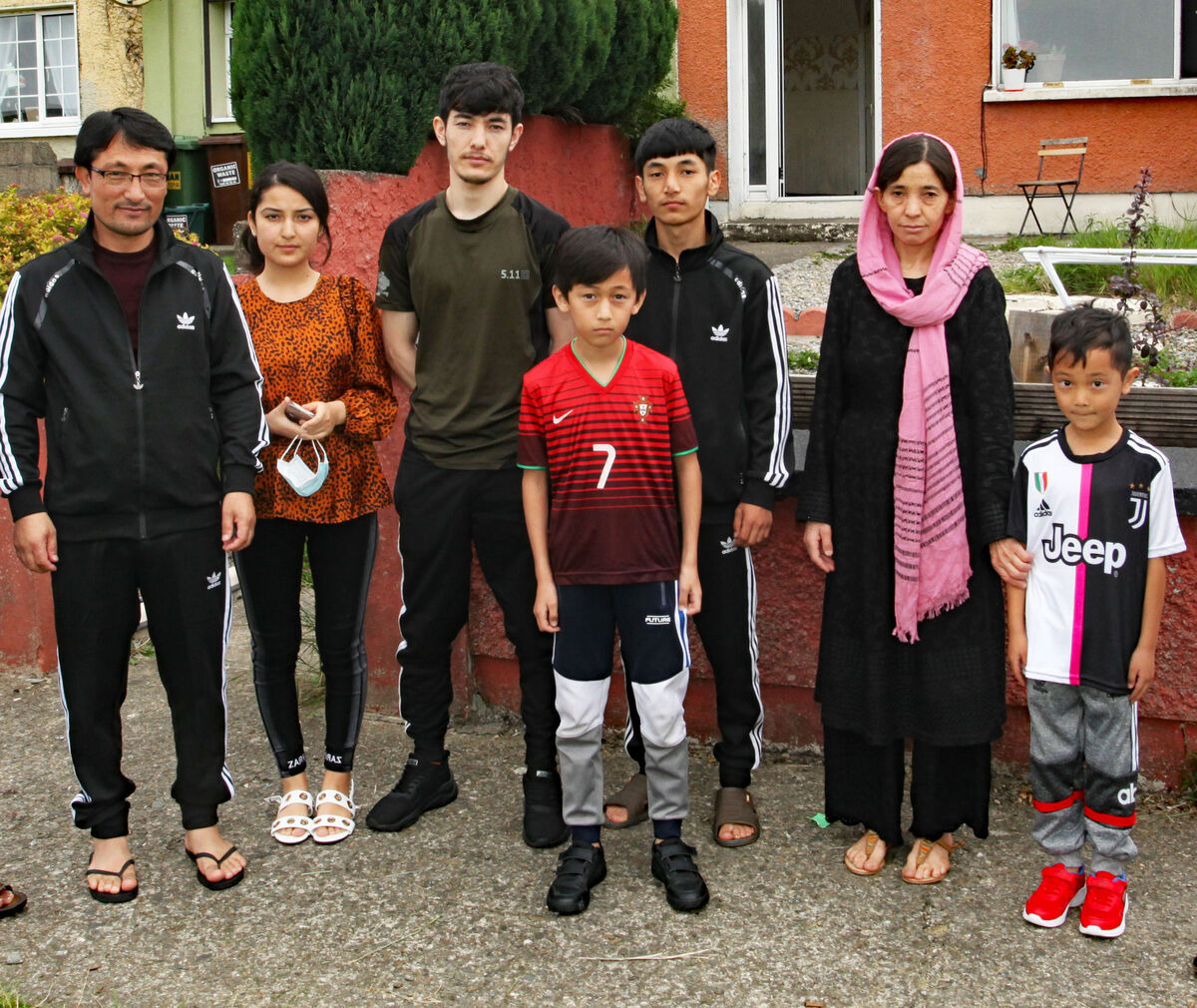 (Left to right) Salim, Nasim, Hasina, Tunaj, Fazlahamd, Najiba and Enaj Saag at home in Limerick. Picture: Brendan Gleeson