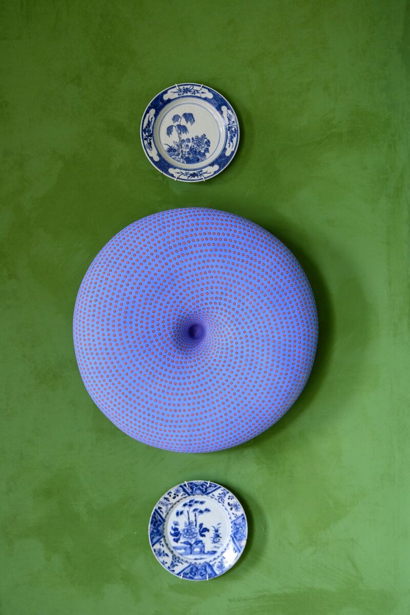 Vintage side plates hang alongside contemporary work by Gráinne Watts, made from stoneware clay. Vintage side plates hang alongside contemporary work by Gráinne Watts, made from stoneware clay.