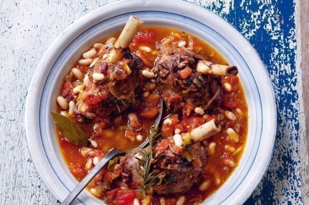 Slow-cooked lamb with cannellini beans, tomatoes and rosemary