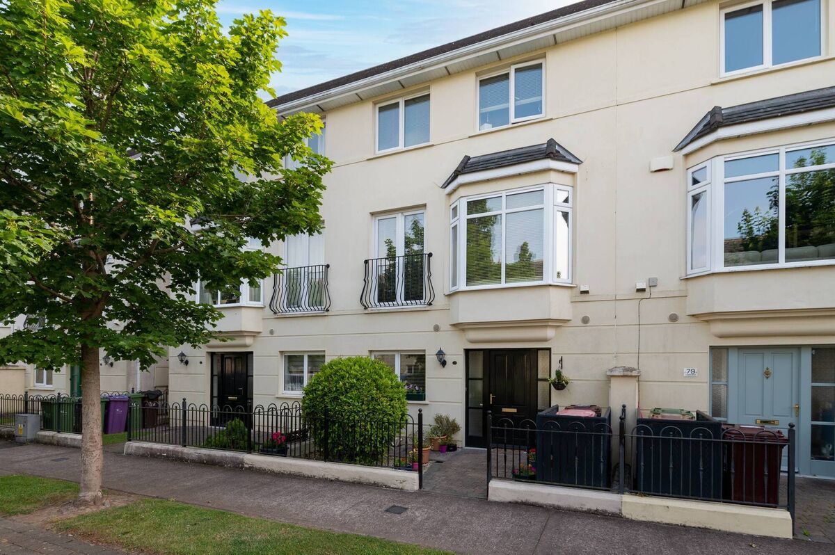 Update: exterior of mid-terraced 78 Leslies Arch, OIld Quarter, Ballincollig,  also for sale with a €440k guide (see details below)