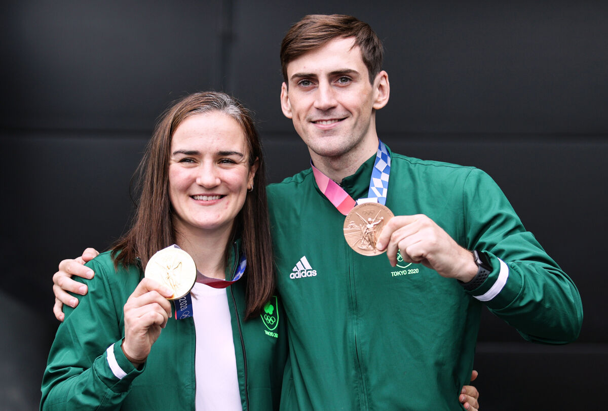 Kellie Harrington with her gold medal and Aidan Walsh with his bronze medal on their return to Dublin Airport. Picture: INPHO/Laszlo Geczo Kellie Harrington with her gold medal and Aidan Walsh with his bronze medal on their return to Dublin Airport. Picture: INPHO/Laszlo Geczo
