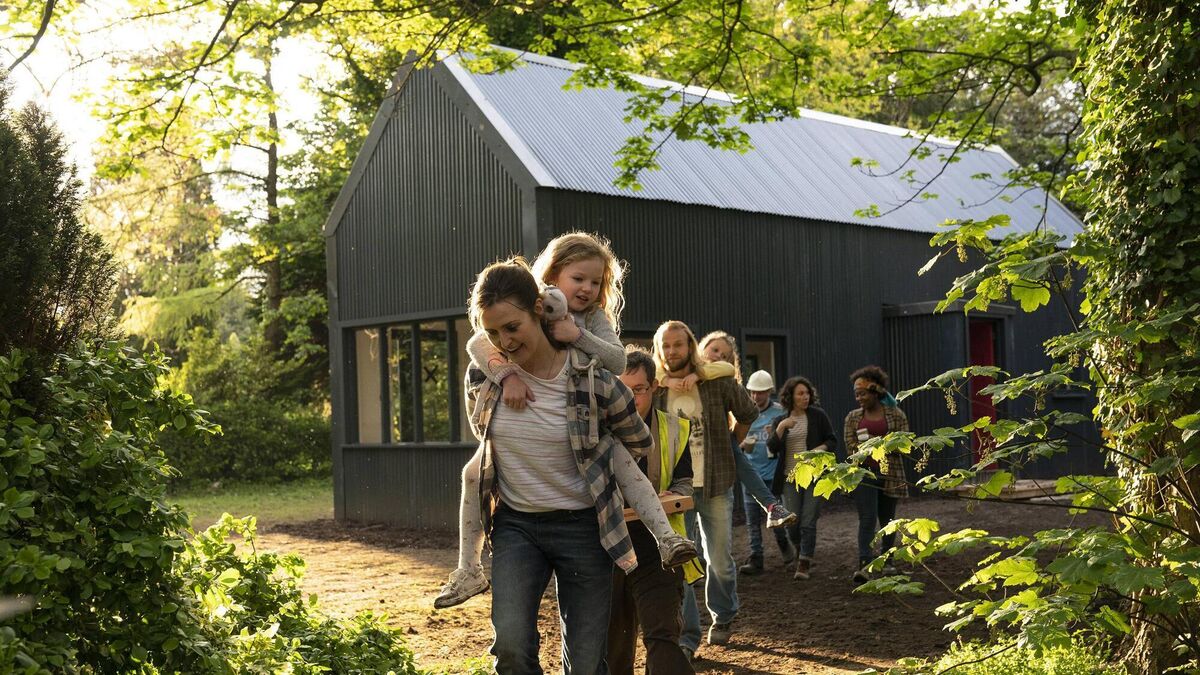 Clare Dunne and fellow cast members in a scene from Herself. 