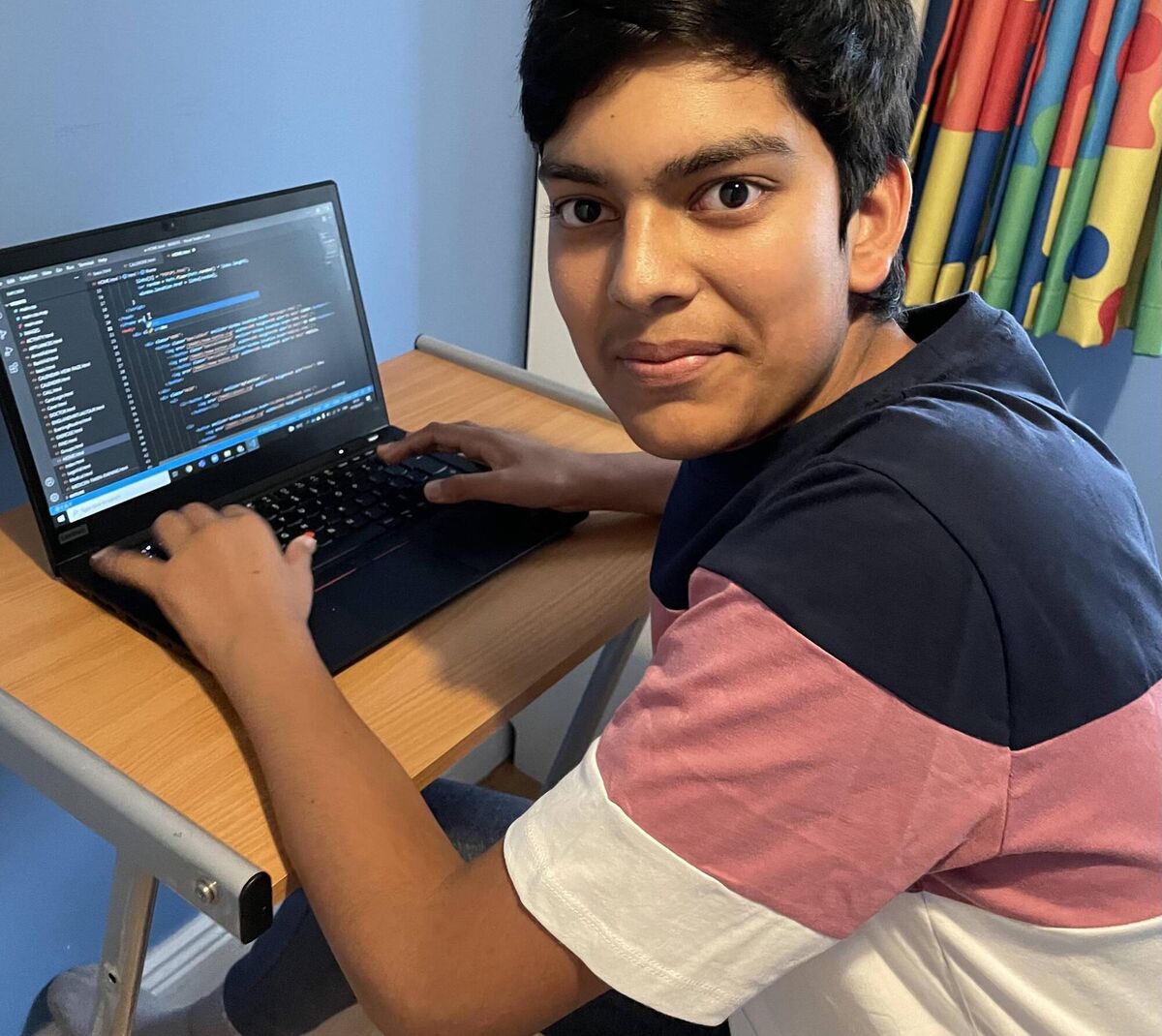 Shivam Gupta hard at work designing the app for the school team's entry for the FIRST Robotics Challenge. Shivam Gupta hard at work designing the app for the school team's entry for the FIRST Robotics Challenge.
