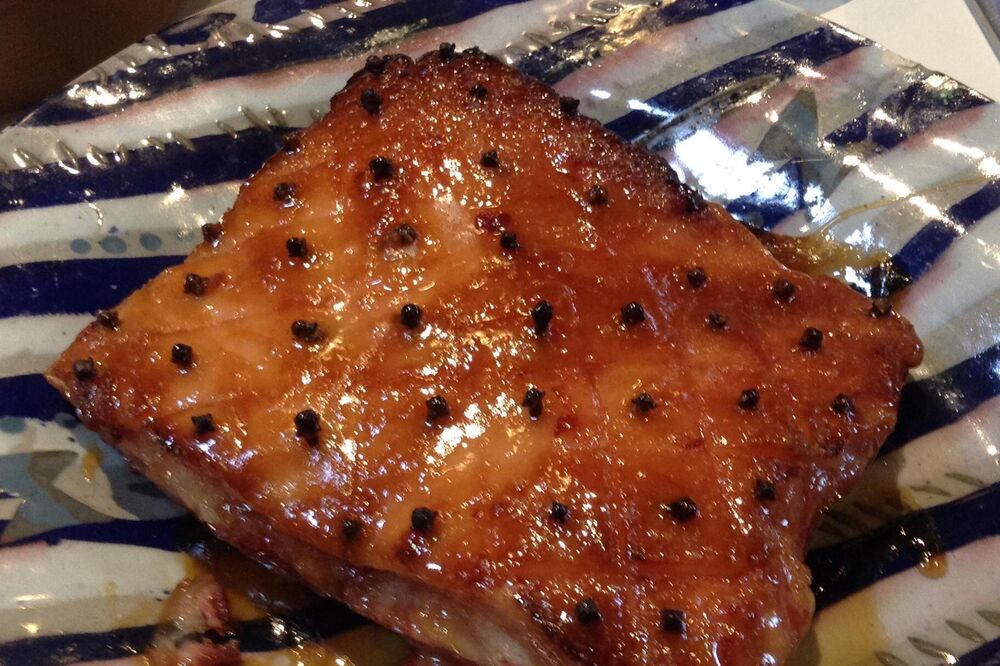 Glazed Christmas ham with cloves and pineapple