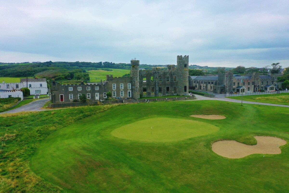 Fore: Twice damaged by fire, Ballyheigue Castle has fronted to a golf course since 1996