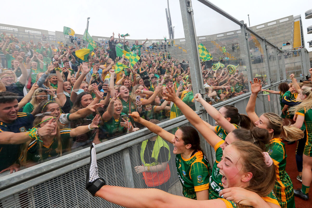 Meath players celebrate with supporters on Hill16. Picture: INPHO/Bryan Keane