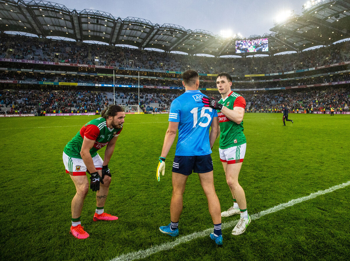Mayo’s Padraig O’Hora and Paddy Durcan with Cormac Costello of Dublin after the All-Ireland semi-final. Picture: INPHO/James Crombie