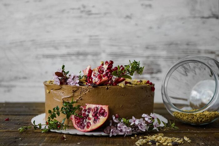 Pecan cake with soft chocolate icing