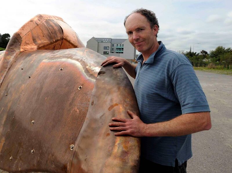 Kevin Holland, pictured with his whale fin sculpture now in Clonakilty. Picture: Denis Scannell Kevin Holland, pictured with his whale fin sculpture now in Clonakilty. Picture: Denis Scannell