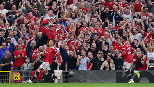 <p>Manchester United's Cristiano Ronaldo celebrates scoring their side's second goal of the game. Picture: Martin Rickett/PA </p>