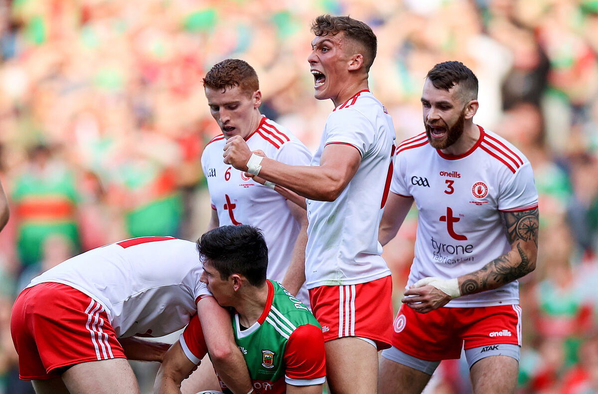 Tyrone's Conn Kilpatrick celebrates winning back possession. Picture: INPHO/Tommy Dickson
