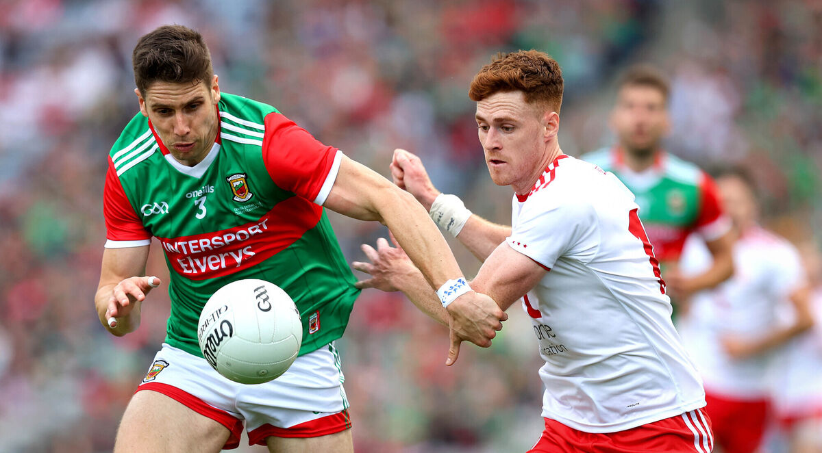 Mayo’s Lee Keegan and Conor Meyler of Tyrone. Picture: INPHO/Ryan Byrne