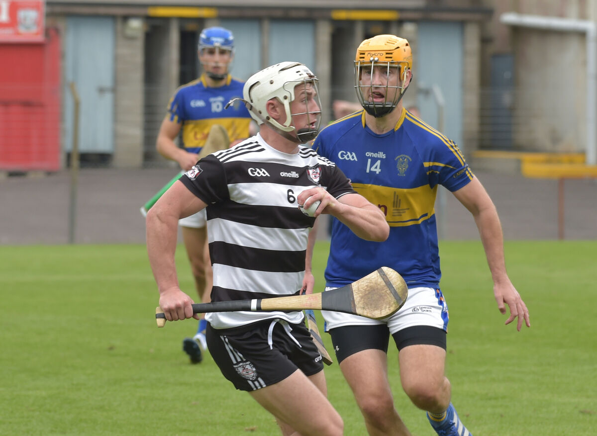 Tommy O' Connell, Midleton under pressure form Liam O'Sullivan, Carrigtwohill. Picture Dan Linehan Tommy O' Connell, Midleton under pressure form Liam O'Sullivan, Carrigtwohill. Picture Dan Linehan