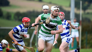 <p> Chris O'Leary, Valley Rovers, in action against Inniscarra. Pic: Larry Cummins.</p>