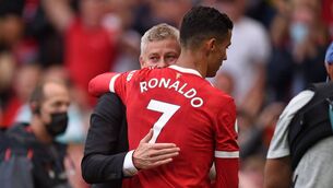<p>Manchester United boss Ole Gunnar Solskjaer embraces his new striker Cristiano Ronaldo after his performance against Newcastle. Picture: Oli Scarff/Getty Images</p>