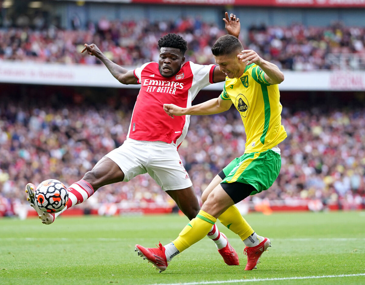 Arsenal's Thomas Partey (left) and Norwich City's Milot Rashica