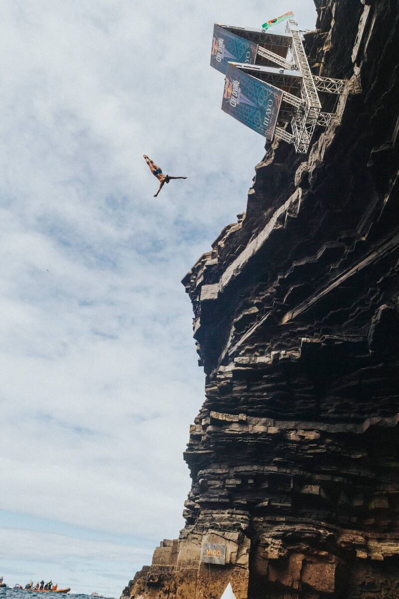 Xantheia Pennisi of Australiadives from the 21 metre platform during the final competition day of the fourth stop of the Red Bull Cliff Diving World Series at Downpatrick Head, Ireland on September 12, 2021. Xantheia Pennisi of Australiadives from the 21 metre platform during the final competition day of the fourth stop of the Red Bull Cliff Diving World Series at Downpatrick Head, Ireland on September 12, 2021.