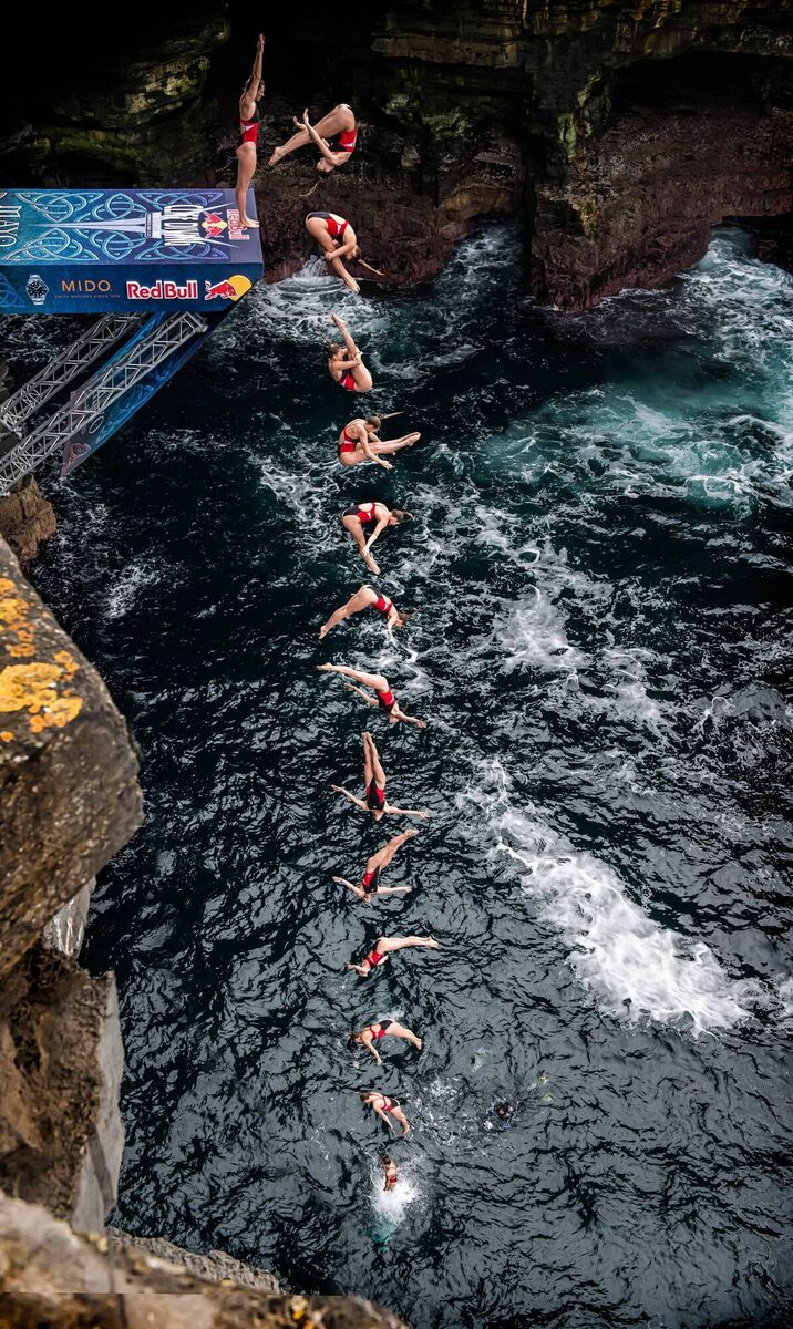 Jessica Macaulay of Canada dives from the 21 metre platform during the first competition day of the fourth stop of the Red Bull Cliff Diving World Series at Downpatrick Head, Ireland on September 11, 2021 Jessica Macaulay of Canada dives from the 21 metre platform during the first competition day of the fourth stop of the Red Bull Cliff Diving World Series at Downpatrick Head, Ireland on September 11, 2021