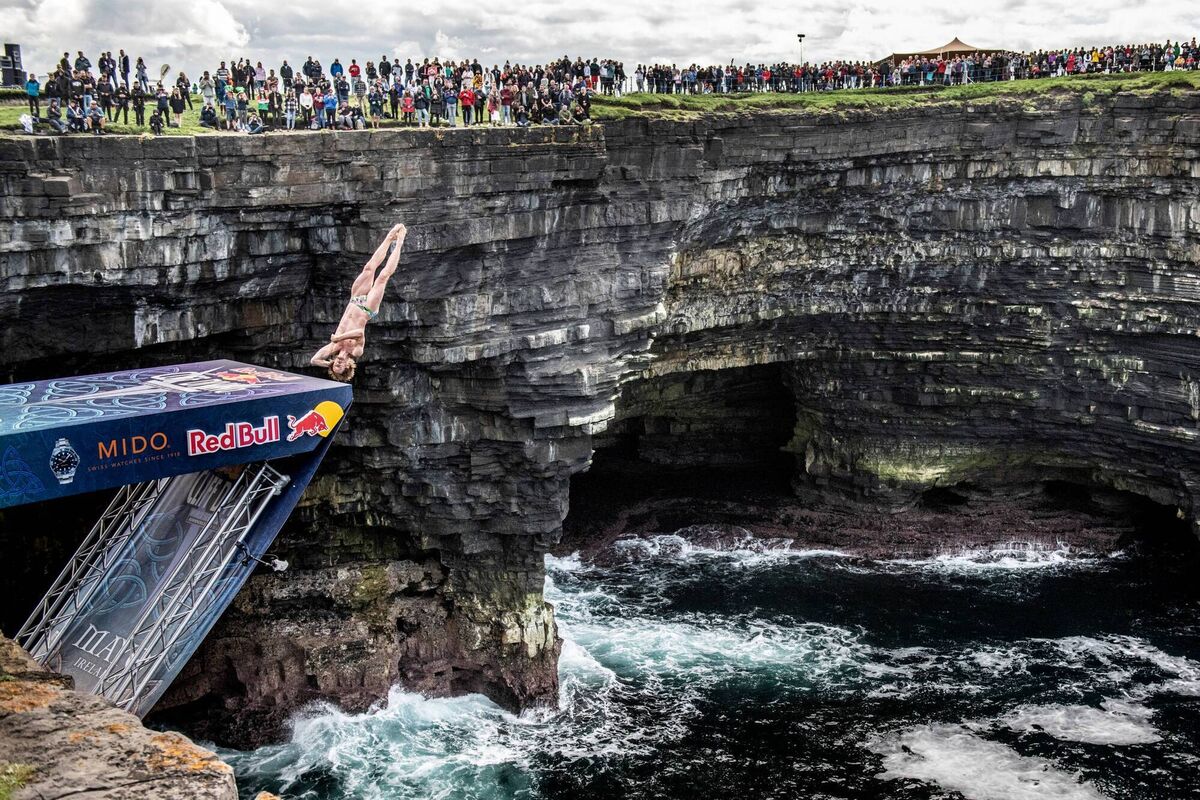 Gary Hunt of France dives from the 27.5 metre platform during the final competition day of the fourth stop of the Red Bull Cliff Diving World Series at Downpatrick Head, Ireland on September 12, 2021. Gary Hunt of France dives from the 27.5 metre platform during the final competition day of the fourth stop of the Red Bull Cliff Diving World Series at Downpatrick Head, Ireland on September 12, 2021.