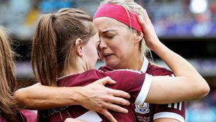 <p>Galway’s Sarah Dervan and Carrie Dolan share a moment after the game Mandatory Credit ©INPHO/Brian Reilly-Troy</p>