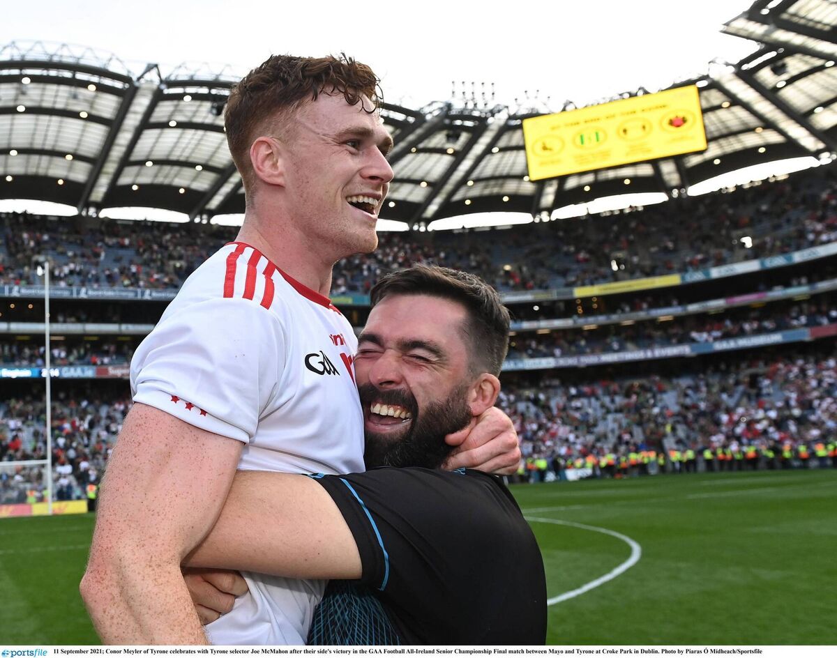WHAT A MAN: Meyler celebrates with Tyrone selector Joe McMahon after their victory over  Mayo