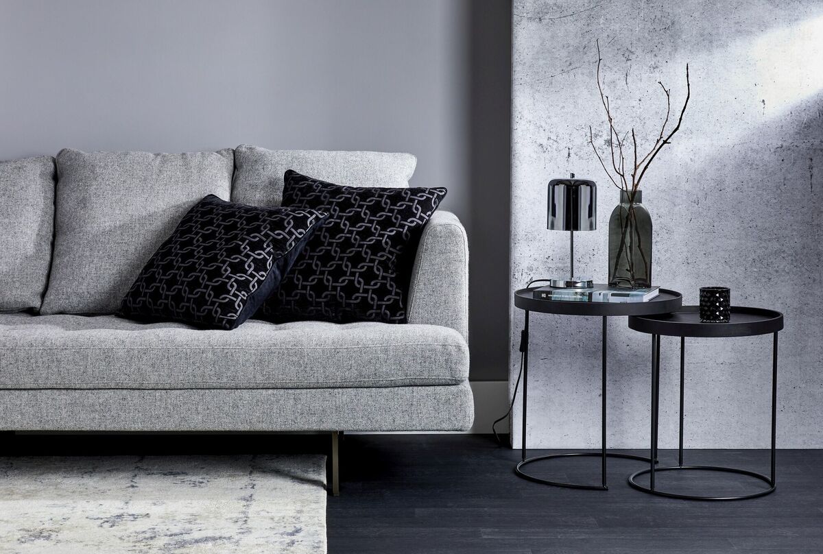  Penneys' pair of black wooden nesting tables offer versatility including lining them up together to create a larger surface area, stacking them in smaller spaces, and distributing them around the room (€40).