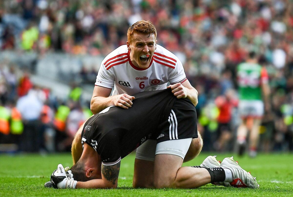 Peter Harte of Tyrone celebrates with goalkeeper Niall Morgan at the final whistle. Picture: David Fitzgerald/Sportsfile