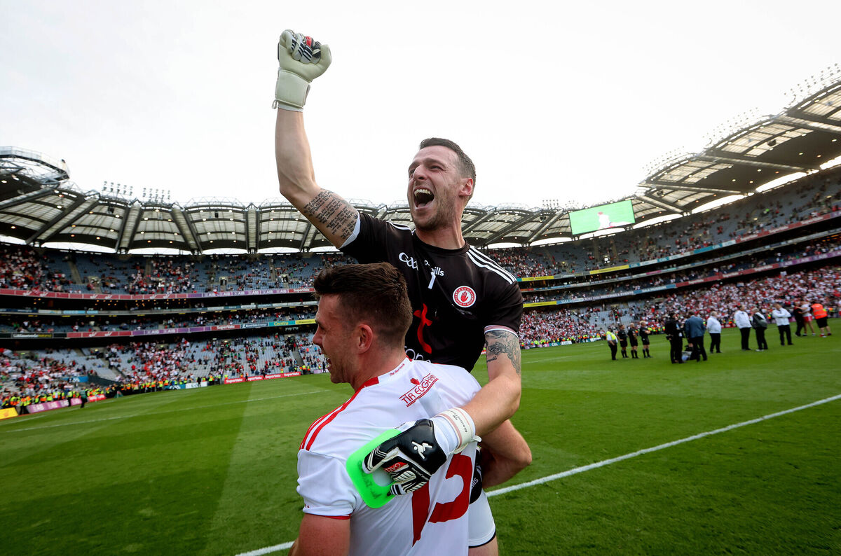 Tyrone goalkeeper Niall Morgan and Darren McCurry celebrate after the game. Picture: INPHO/Ryan Byrne