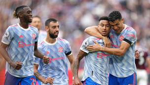 <p>Manchester United's Jesse Lingard (centre) celebrates scoring their side's second goal of the game with Cristiano Ronaldo. Picture: Mike Egerton/PA </p>