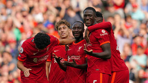 <p>Liverpool's Naby Keita (centre) celebrates with team-mates after scoring their side's third goal of the game</p>