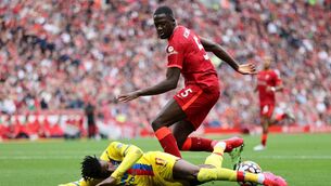 <p>LIVERPOOL, ENGLAND - SEPTEMBER 18: Wilfried Zaha of Crystal Palace is challenged by Ibrahima Konate of Liverpool during the Premier League match between Liverpool and Crystal Palace at Anfield on September 18, 2021 in Liverpool, England. (Photo by Clive Brunskill/Getty Images)</p>