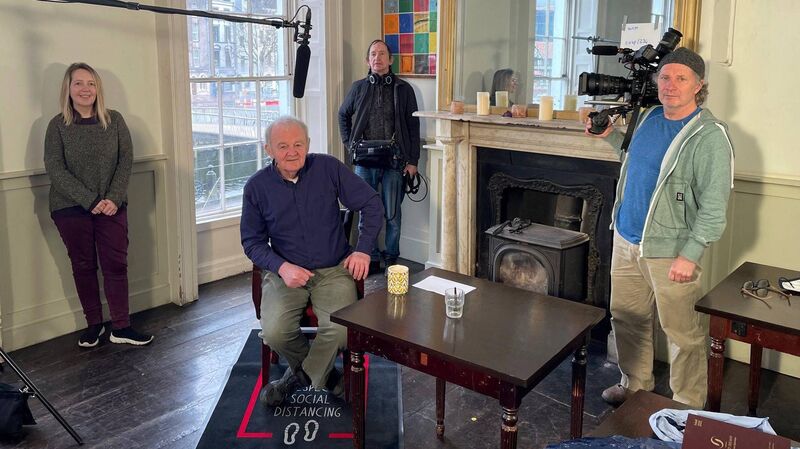 An image from the filming  The Quay Co-op documentary: L-R, Emma Bowell (Frameworks Films), Arthur Leahy ( Quay Co-op), Neil Hurley (Frameworks Films) and Eddie Noonan (Frameworks Films).