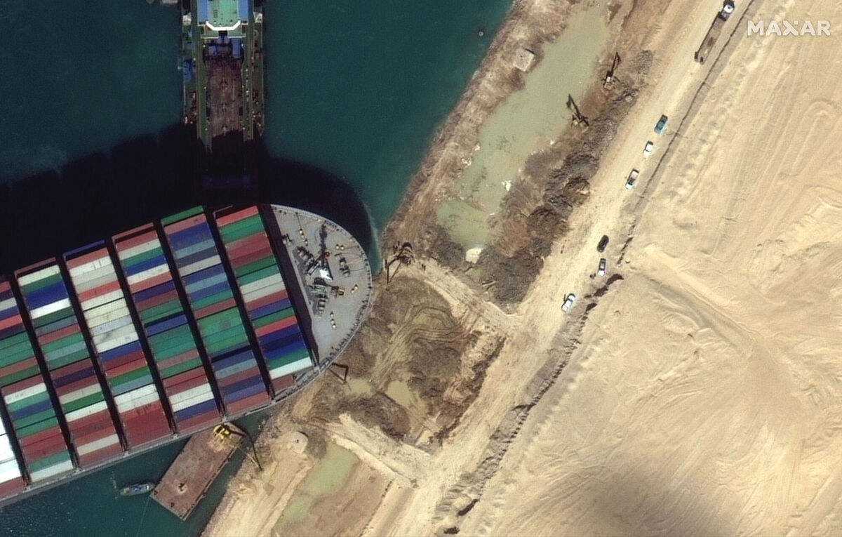 The Ever Given – one of the world's largest container ships, carrying about 40,000 containers – which was was stuck in the Suez for six days, 'wrecked the supply line'. File picture: Maxar Technologies via AP