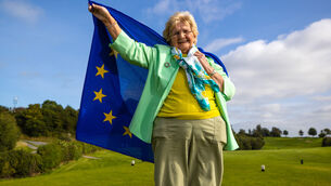 <p>Shane Lowry’s Grandmother Emily Scanlon is presented with a European flag at Esker Hills Golf Club ahead of the 2021 Ryder Cup this weekend. Picture: INPHO/James Crombie</p>