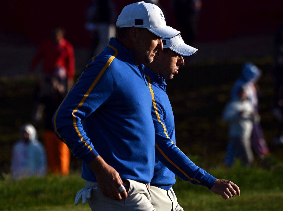 Europe’s Rory McIlroy (right) and Ian Poulter. Picture: Anthony Behar/PA 