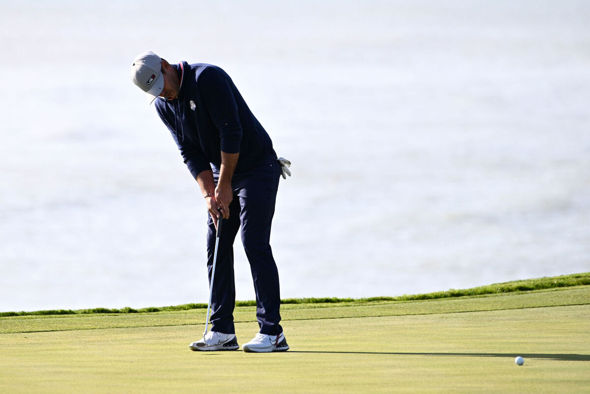 Team USA's Brooks Koepka putts on the eighth hole. Picture: Anthony Behar/PA 