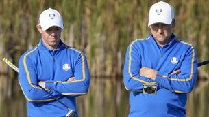 <p>Rory McIlroy and Ian Poulter sat out the foursomes session on day two of the 43rd Ryder Cup at Whistling Straits (Charlie Neibergall/AP)</p>